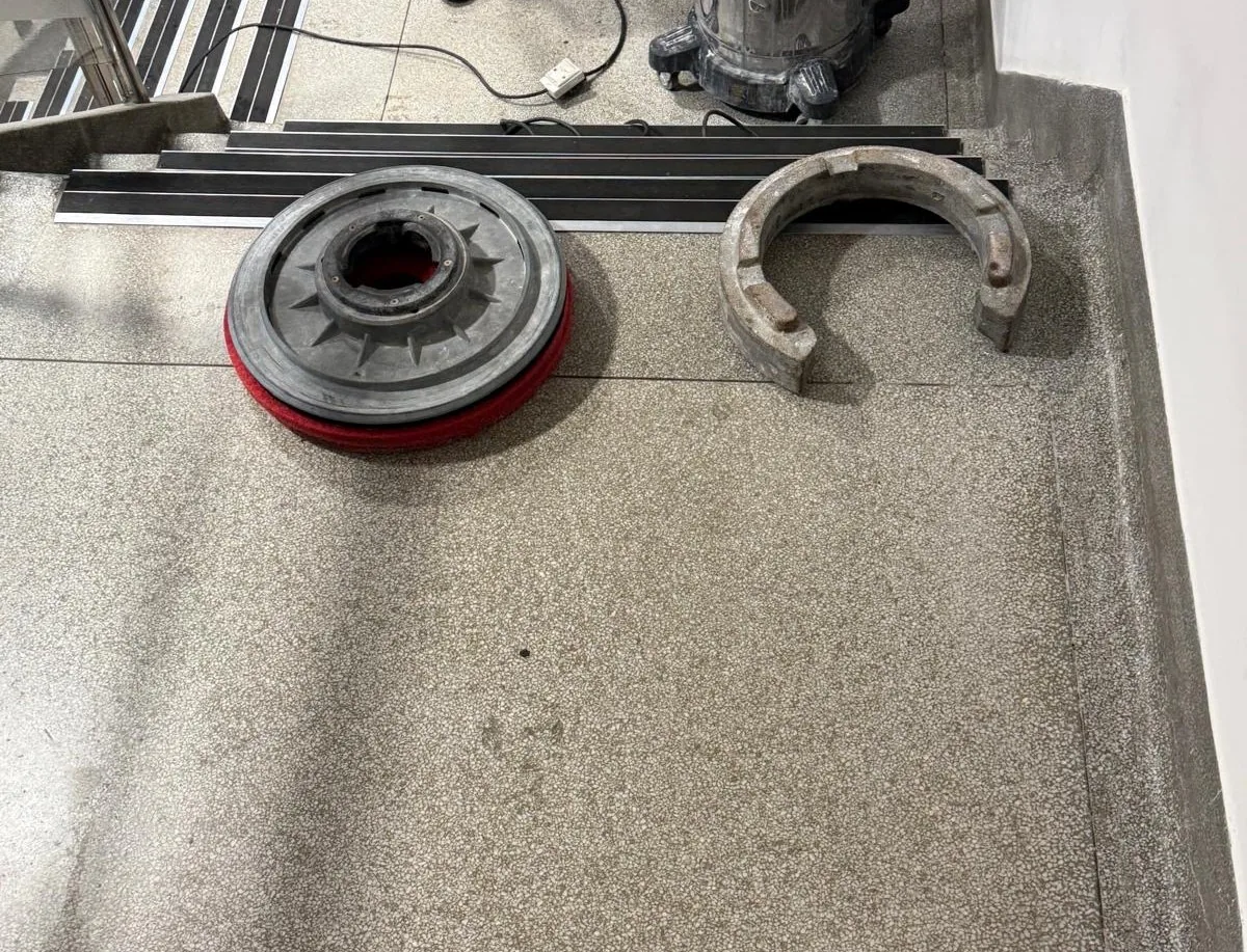 Terrazzo landing and floor machine before restoration at St Mary’s Hospital