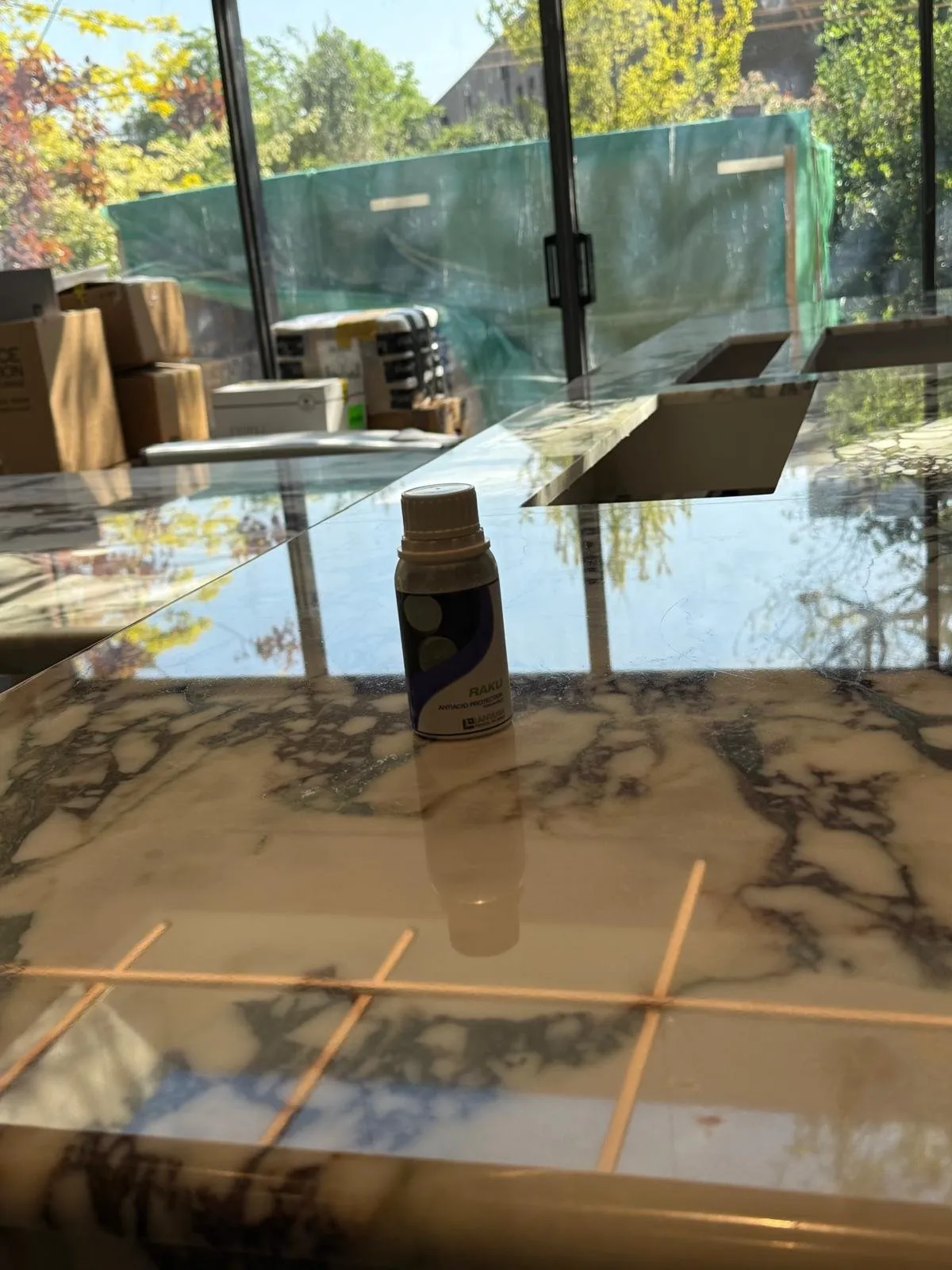 RAKU marble protection on a London kitchen island — detail 7